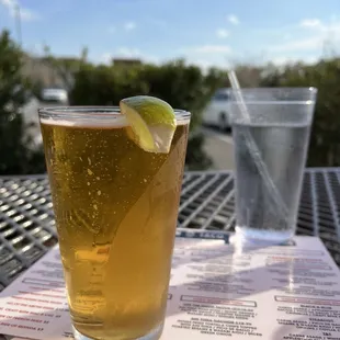 a pint of beer and a glass of water