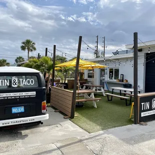 a van parked in front of a restaurant