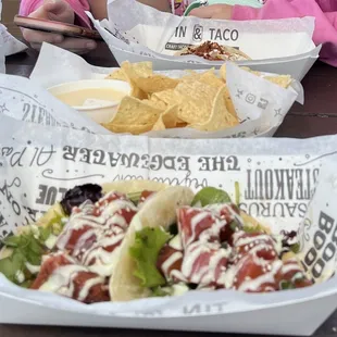 Ahi tuna tacos (chips &amp; queso behind it)