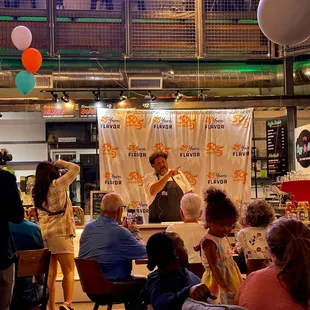 Chef Aaoron May showing us how he made his Bottle Rockets dish