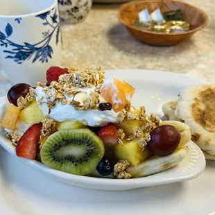 An unexpected surprise! Fresh fruit, granola and yogurt...