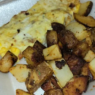 Bacon and cheese omelet with home fries