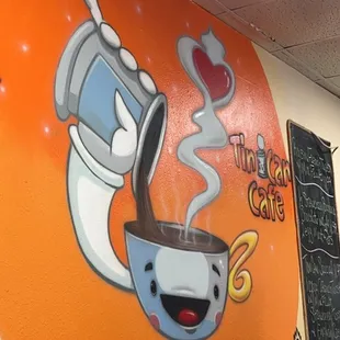 a mural of a cup of coffee