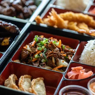 a bento box of food