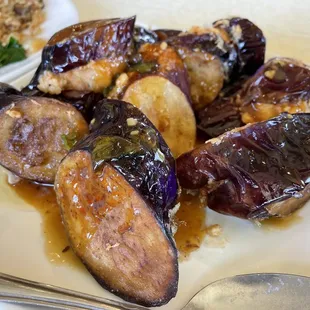a plate of eggplant with sauce
