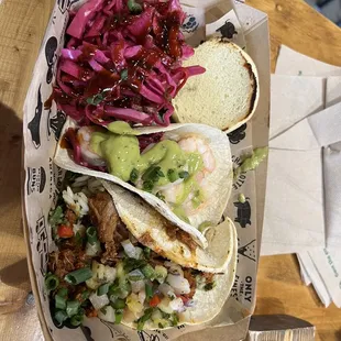 Slider, shrimp taco, and Al pastor taco