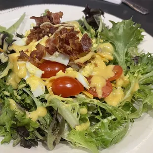 House salad w/ honey mustard dressing.