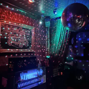 a disco ball and a piano