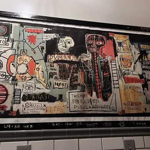 Jean Michel Basquiat artwork in the restroom