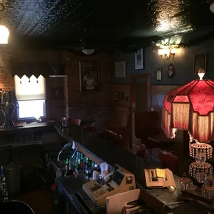 a dimly lit bar area