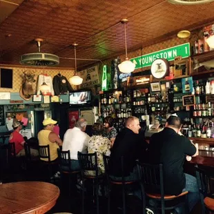 people sitting at a bar