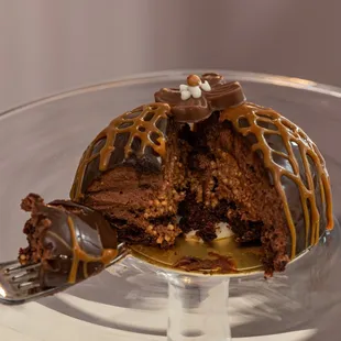 a half eaten chocolate cake