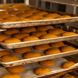 trays of baked muffins in an oven