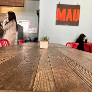 a wooden table in a restaurant