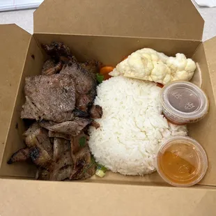 Lemongrass Pork -- Grilled lemongrass pork shoulder served with pickled daikon, carrots &amp; cauliflower.