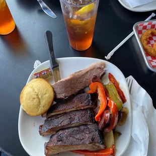 Cornbread, ribs, brisket, and hot link lunch