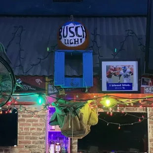 a brick bar with neon lights