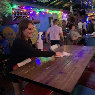 a woman sitting at a table