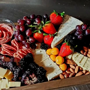 a platter of fruit and cheese