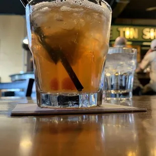 a drink in a glass with a straw