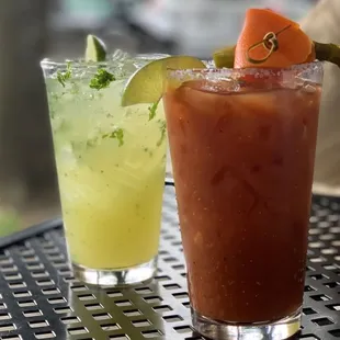 two cocktails on a table