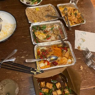 Family style take out - everything was great (tofu, fish, pineapple fried rice, pad see ew, etc.)