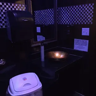 The glow lighting that sets the mood for the bathroom. Very odd, yet different.