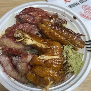 Roast pork and soy chicken over rice