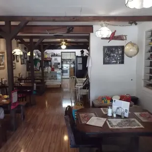 ows a woman sitting at a table