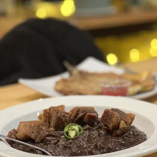 a plate of beef and rice