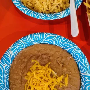 The family pack actually comes with 2 bowls of rice and 2 bowls of beans. When dining in anyway. Both were great.