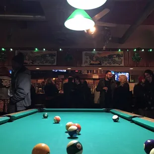 a pool table with balls on it