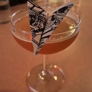 a cocktail in a coupe glass