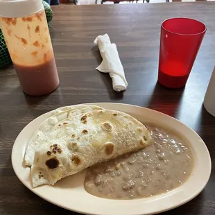 Bacon &amp; egg breakfast taco and beans.