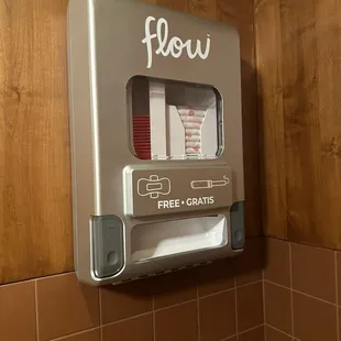 a paper towel dispenser in a bathroom