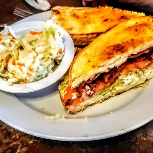 Blt:
 Bacon piled high with, lettuce, tomato,
 and mayo served on toasted sourdough.