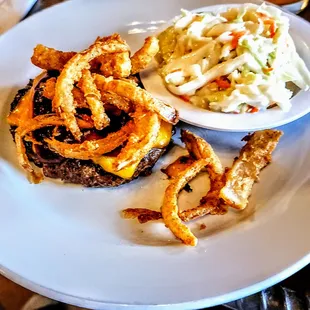 Chargrilled burger topped with onion straws, cheddar cheese, and barbecue sauce, but without the toasted Kaiser bun.