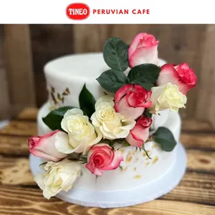 a cake decorated with roses
