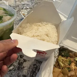 2 sides of rice in one large container