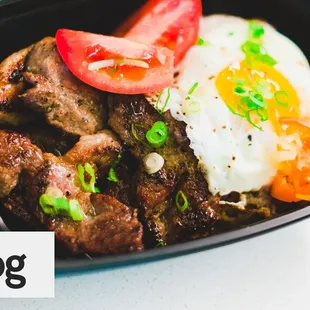 a meal in a black container