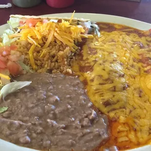 Mexican plate - Two cheese enchiladas and a crispy taco