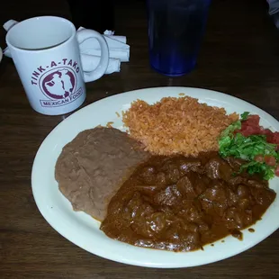 carne guisada plate, rice, and beans at tink  a tako.