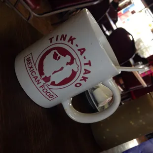 a cup of coffee on a table