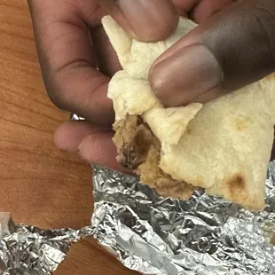 Cockroach inside Bean and Cheese Taco