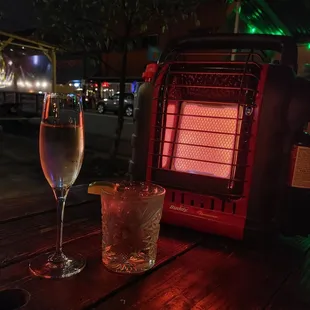 a glass of wine and a toaster