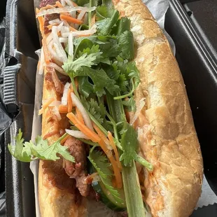 5-spice grilled pork bahn mi = Vietnamese sandwich with unique Lao /Midwest touch by the chef Bunlot = must try!!