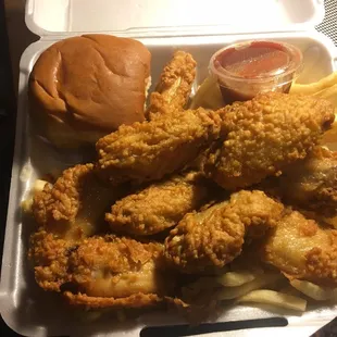 10 wings, fries and a dinner roll 11 bucks and change. Pretty good.