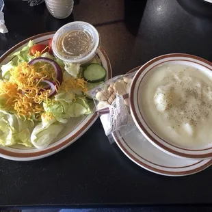 Every dinner includes a bowl of soup of the day. Potato soup and salad with Greek dressing