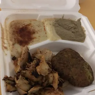 Chicken platter with falafel, hummus and baba ghanouj.