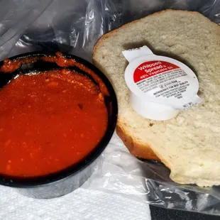 Fresh baked bread, side of Sunday sauce.